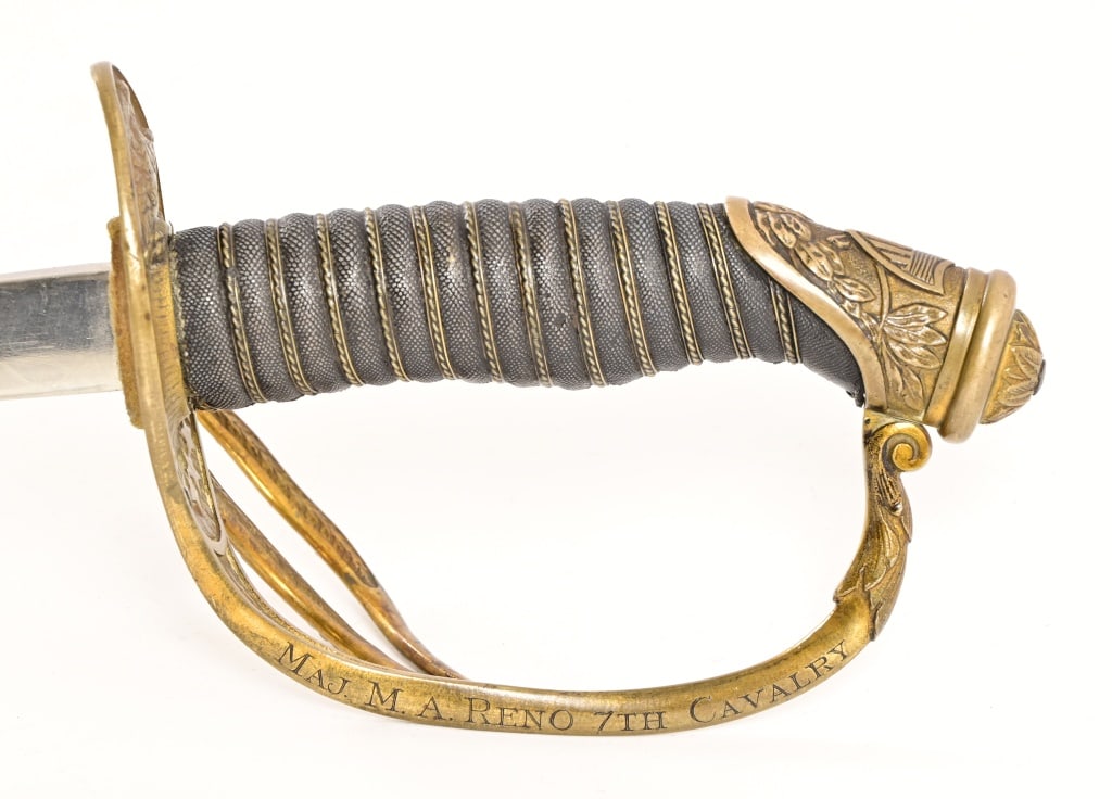 Major M. A. Reno 7th Cavalry Presentation Sword: US Model 1872 P Cavalry Officer's Model saber by Henry V. Allen & Co. Guard is engraved "MAJ. M.A. RENO 7TH CAVALRY". Blade measures 34", very good condition with scabbard. Overall length 40"