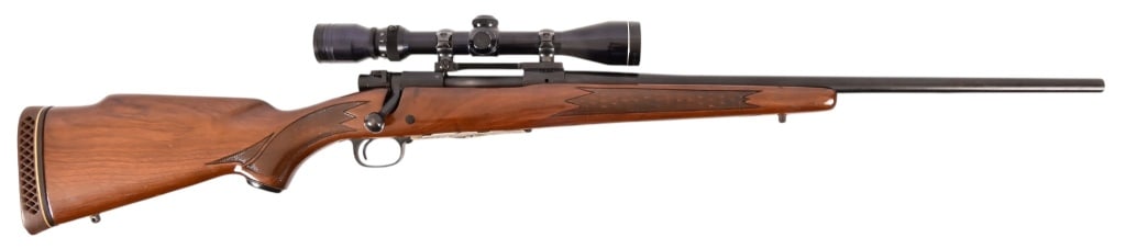 Winchester Model 70 Bolt Action .30-06: S/N 861379. Tasco 3-9x40 scope, 22" barrel. Very good bore and action. Engraved floorplate with deer motif. Modern