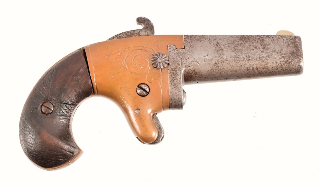 National Arms Derringer .41 Cal.: SN 1029. 2" barrel. Swing out type. Very nice condition. Antique.