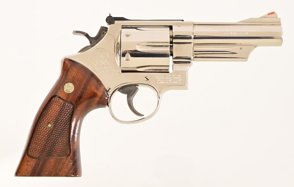 S&W Model 29-2 Revolver .44 Magnum: S/N N769621. Nickel plated, Goncalo Alves grips,4" barrel with target hammer and trigger. Modern