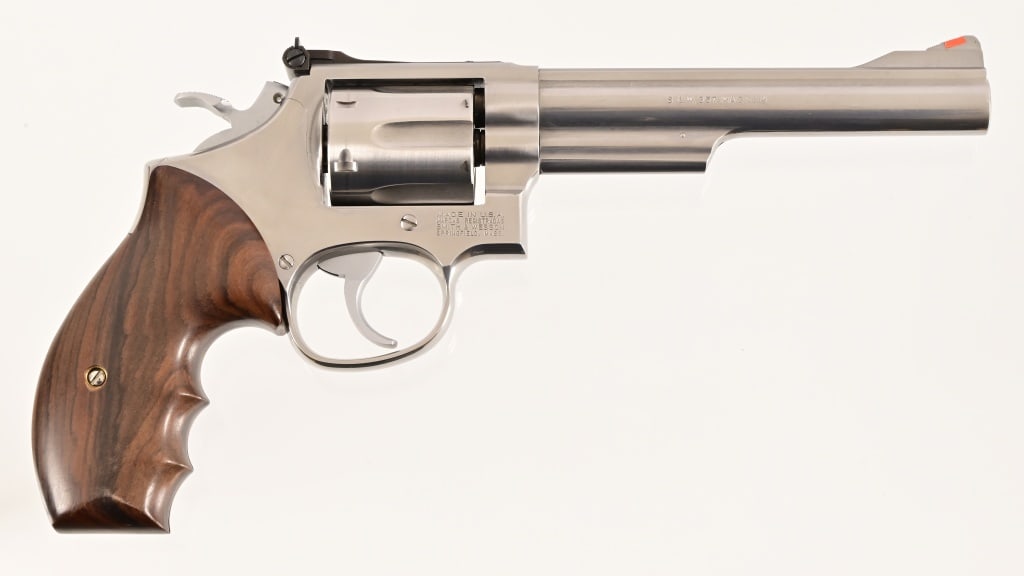 S&W Model 66-4 Revolver .357 Magnum: S/N BSU3197. Target hammer/sights, 5 7/8" barrel, stainless finish. Modern