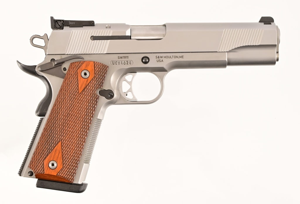S&W SW1911 Semi-Auto .45ACP: S/N UCW4624. Like new condition.5" barrel, good bore. Modern