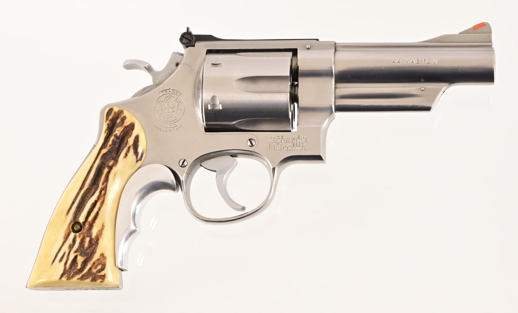 S&W Model 629 Revolver .44 Magnum: S/N N852153. Stainless finish, 4" barrel, staghorn grips, Tyler grip adapter. . Modern