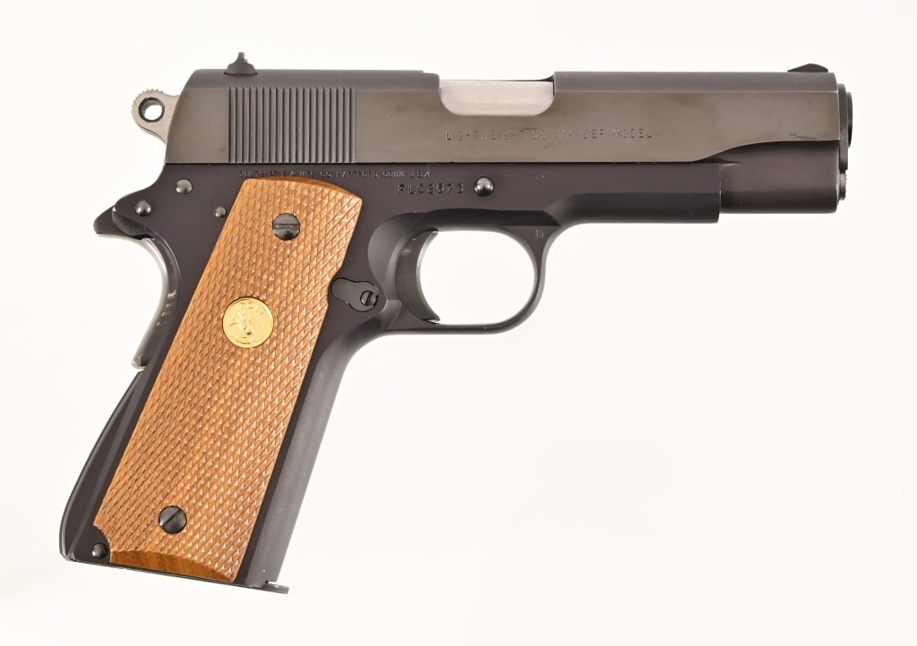 Colt 1911 MK IV Lightweight Commander .45ACP: S/N FL02673. 4" barrel, good bore. Very nice condition, series 80. Modern.