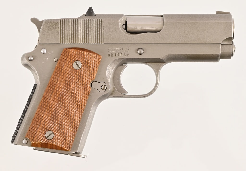 Detonics Semi-Auto .45 ACP: S/N CR19862. Excellent condition in original box. Modern