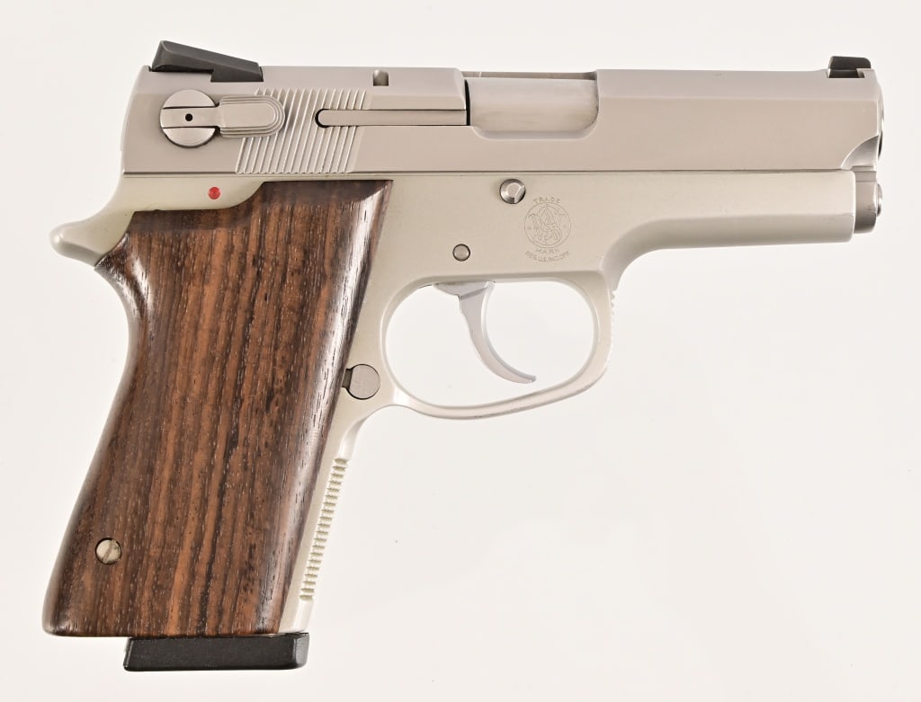 S&W Model 3913 Semi-Auto 9mm: S/N TEB1992. 3 3/8" barrel, good bore. Stainless with wood grips. Modern.