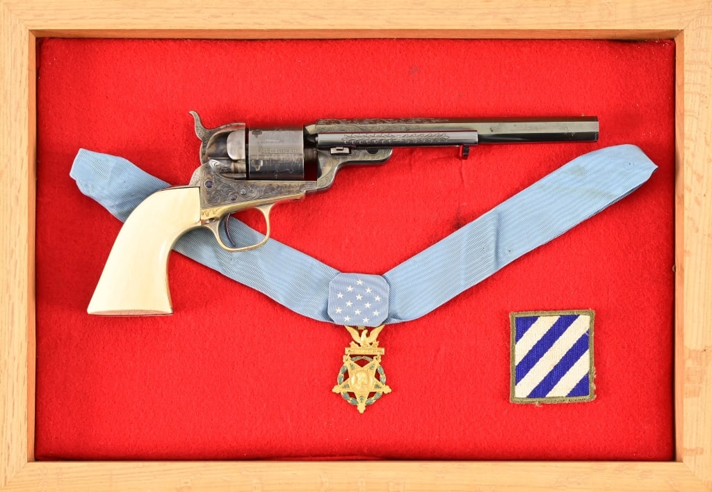 Audie Murphy Owned, Engraved Colt 1871-72 Open Top: Serial number 239, dates first year manufacture by Colt in 1871. According to the provenance, the Colt was Gifted to Audie Murphy in 1950. Blued finish with case-hardened coloring, scroll engraving. P