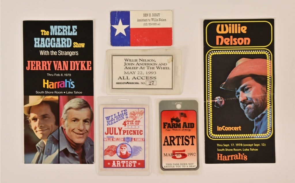 Ray Benson's Willie Nelson Memorabilia Collection: Includes three Willie Nelson backstage passes (4th July picnic measures 3" x 4 1/2"), Willie Nelson's assistant Ben H. Dorcy business card, Willie Nelson in concert at Harrah's post card (4" x 8"), an