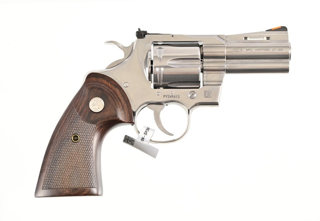 Colt Python .357 Magnum Revolver: 3" barrel, stainless steel finish, wood grips, in new condition original Colt factory case. Modern.