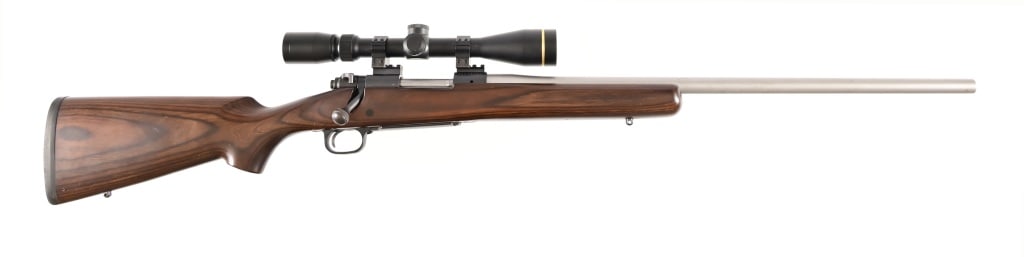 Winchester Model 70 SA 243 Rifle With Scope: S/N G2404124. Bolt action rifle with Leupold 4.5-14 x 40 VX-31 scope. 24" heavy stainless barrel. Modern.
