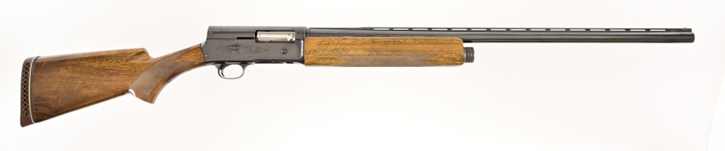Browning A5 Magnum 12 Gauge Shotgun: S/N: 72V10214. 27 1/2" barrel, some engraving on the receiver. Belgium made. Modern.