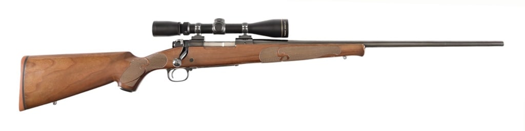 Winchester Model 70 Featherweight Rifle .300 WSM: S/N: G2493649. Bolt action rifle, 24" barrel. Modern. Leupold Scope.