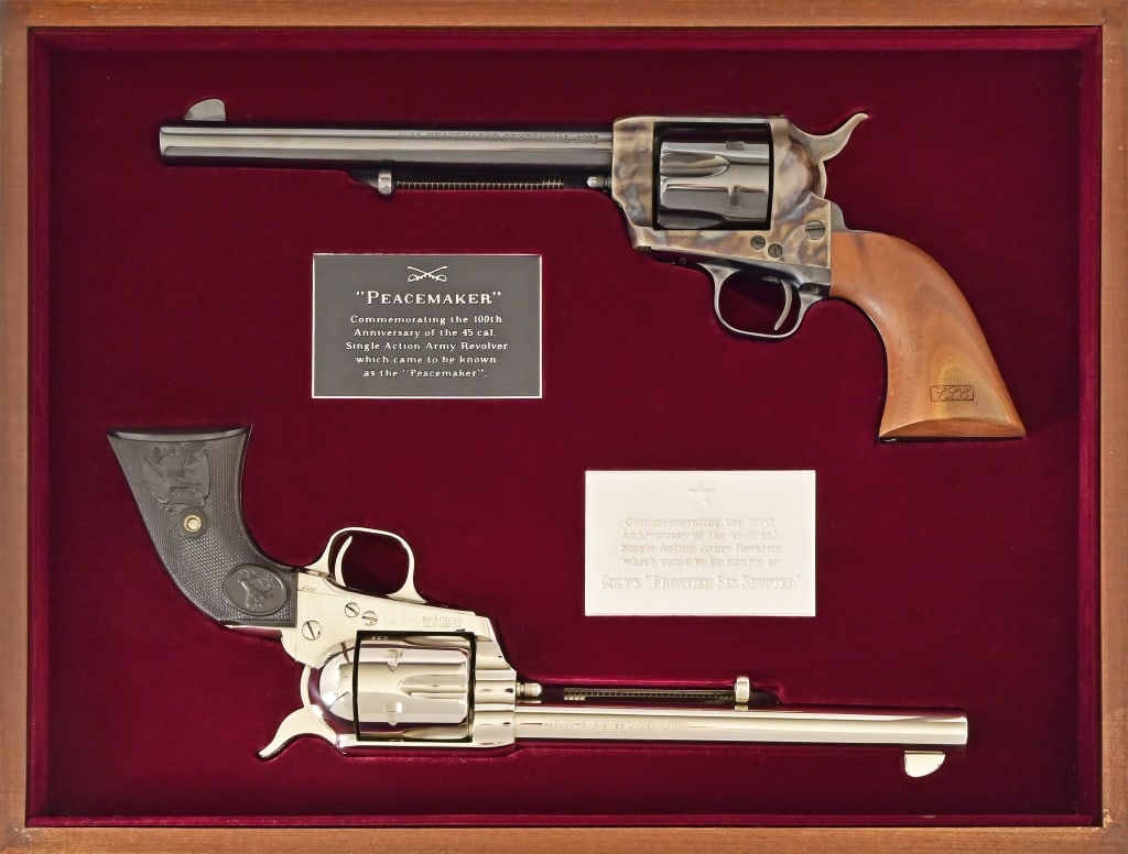 Colt 100th Anniversary Revolvers Cased Pair 1973: S/N 233MPC & MPC233. 100th Anniversary Colt 1873 Peacemaker .45 with blue finish (S/N MPC233) 7 1/2" barrel. 100th Anniversary Colt Frontier .44-40 Six Shooter Stainless (S/N 233MPC). 7 1/2" barrel. D