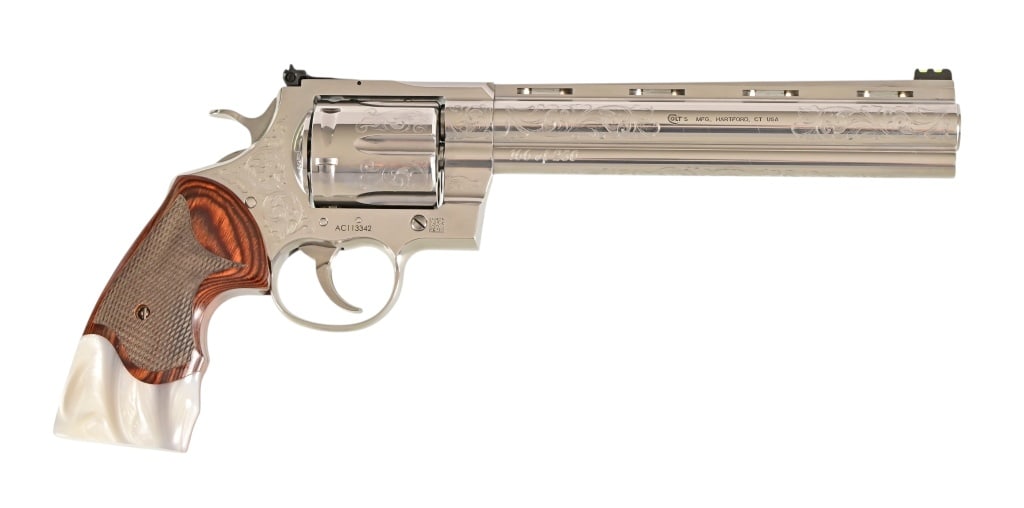 Engraved Colt Anaconda .44 Magnum Revolver: S/N AC113342. Engraved Limited Edition166 of 250. In box with extra grip. Comes with COA. 8" barrel. Modern.