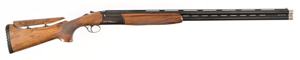 Fausti XF4 Sport 12 Gauge O/U Shotgun: S/N: B60932. Manufactured in Italy, right hand action with blue metal finish. 30? barrel with 3? chambers. Highly figured pistol grip stock and checkered forend. Single selectable triggers, LOP 14 ??,