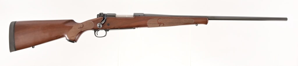Winchester Featherweight Model 70 Rifle .270 WSM: S/N: G2502135. Bolt action rifle, wood checkered stock. 23 1/2" barrel. Modern.