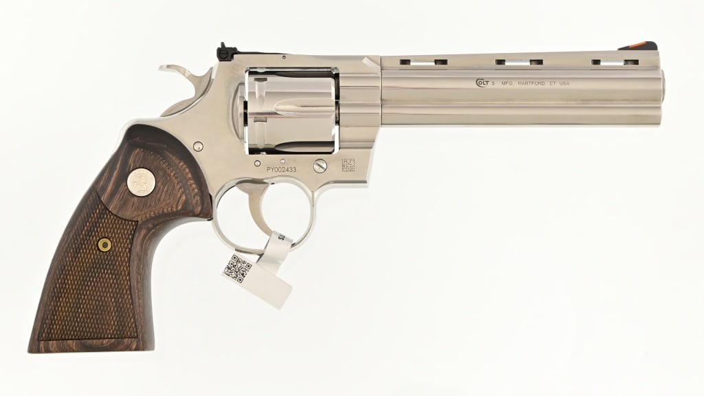 Colt Python .357 Magnum Revolver: S/N: PY002433. 6" barrel, in original factory box. New model Python. Modern.