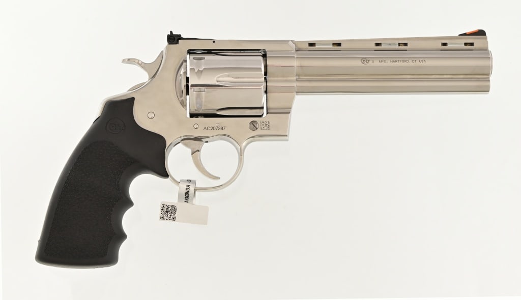 Colt Anaconda .44 Magnum Revolver: S/N: AC207387. 6" barrel, stainless steel, rubber grips, target sight, in original Colt box. New model. Modern,