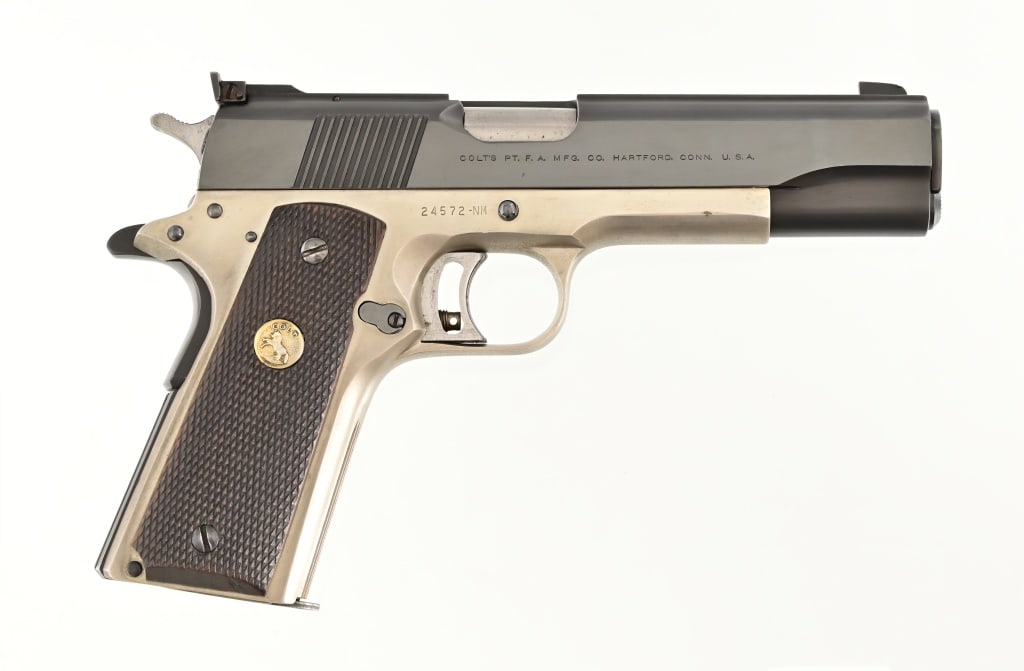 Colt 1911 National Match .45 In Case: S/N: 24572-NM. Wooden presentation case with 1 extra magazine and 1 box ammo. Modern.