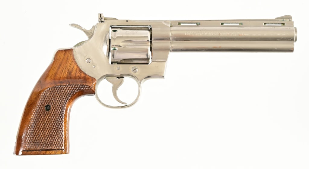 Colt Python .357 Magnum Revolver: 6" barrel, in Colt factory box. Finish has some issues, action functions properly. Non-Colt grips. Modern.
