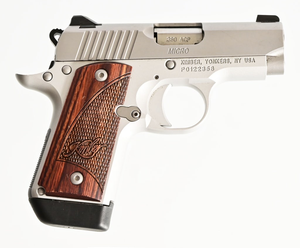 Kimber Micro .380: 2 3/4" barrel, in original factory box. Included is a holster and 2 extra magazines. Modern.