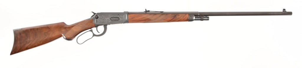 Winchester 1894 -1994 Centennial .30-30: 1894-1994 Centennial Commemorative. Engraved receiver, 3/4 magazine, half round half octagon barrel, high grade wood stocks. 26" barrel, modern.