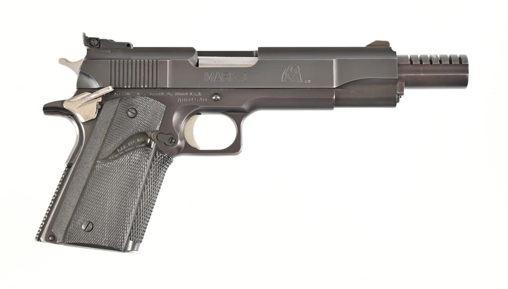 LAR Grizzly Mark I Semi Auto Pistol .45 Win Mag: S/N: A004540. 2 extra magazines, extra spring, and disassembly tool. 6 1/4" barrel. Modern.