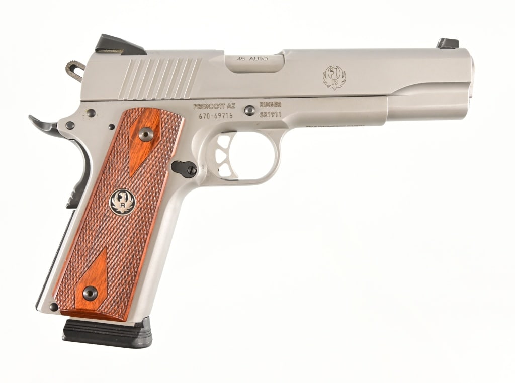 Ruger SR1911 Pistol 45 Auto: S/N 670-69715. In original factory box. 2 magazines. 5 " barrel. Modern.