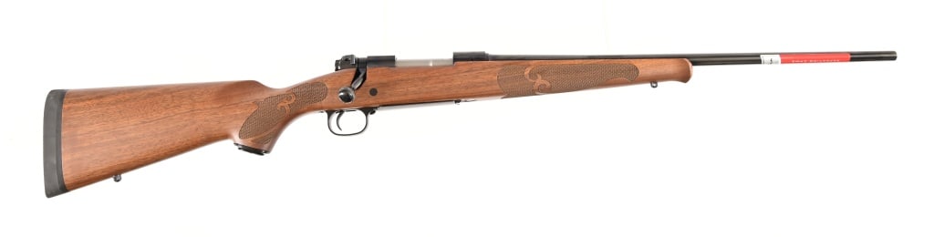 Winchester Model 70 Featherweight Rifle .22-250: S/N: PT08468YZ35G. Bolt action rifle, made in Portugal by Browning Viana. imported by BACO Inc., Morgan, Utah. 22" barrel, modern. New Unfired condition