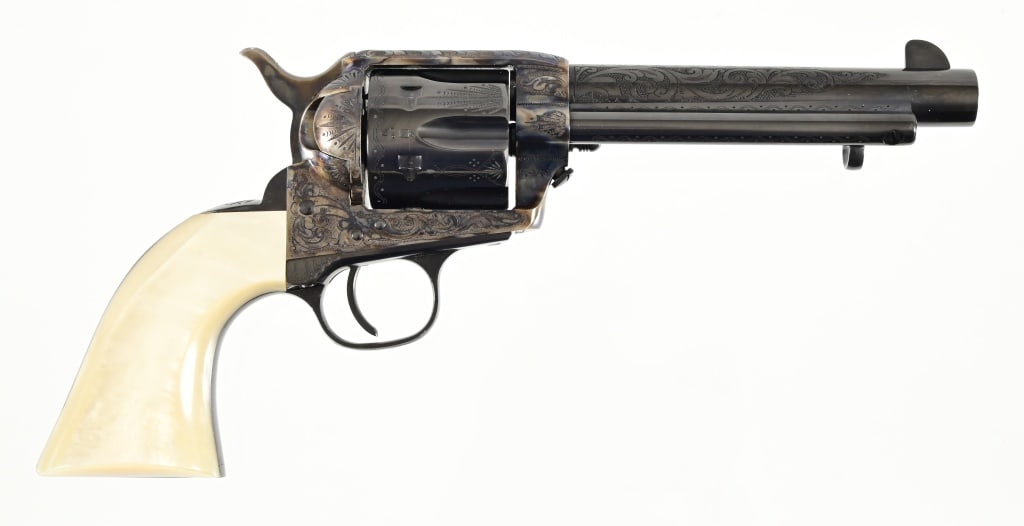 Uberti Single Action Engraved .45 Colt Revolver: S/N UL7255. 5 1/2" barrel. original factory box. Imported by Stoeger- Accokeek, MD. Modern.