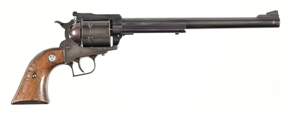 Ruger New Model Super Blackhawk .44 Mag Revolver: 83-46919. 10 1/2" barrel. Decent condition, grips are solid but rough. Modern.