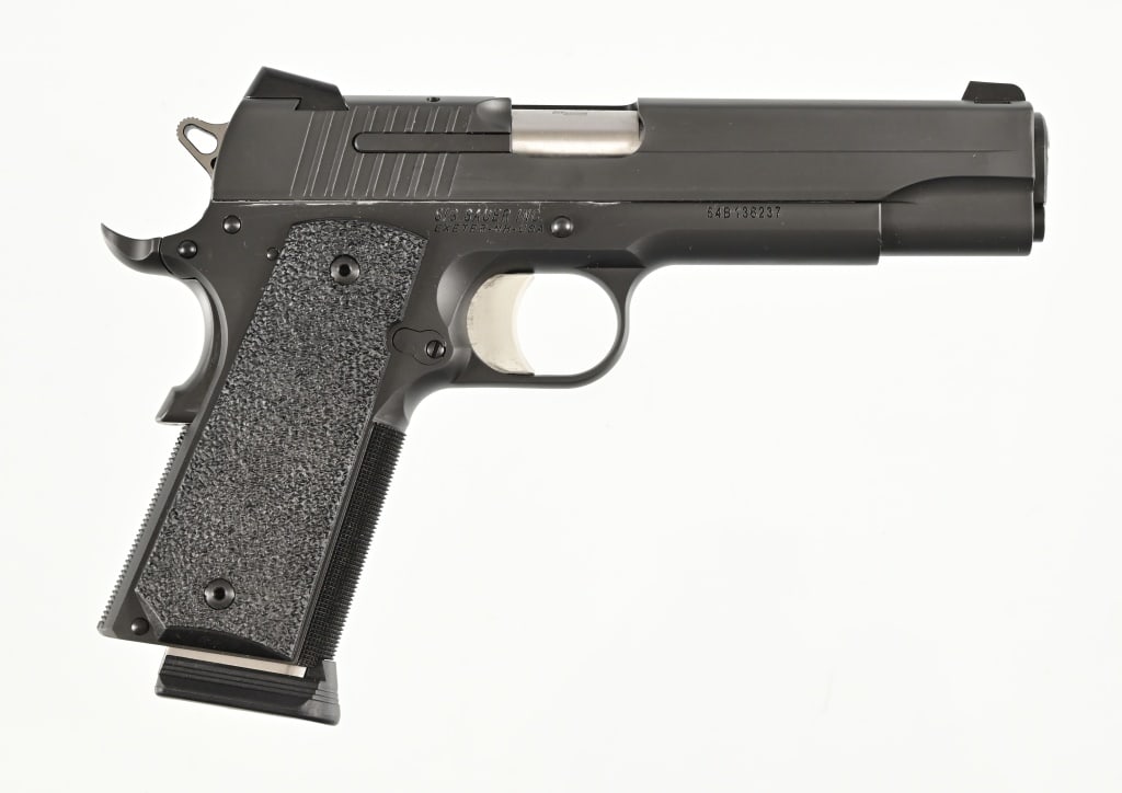 Sig-Sauer 1911 .45 Auto Pistol: 5" barrel. In original factory case. Two magazines. Modern.