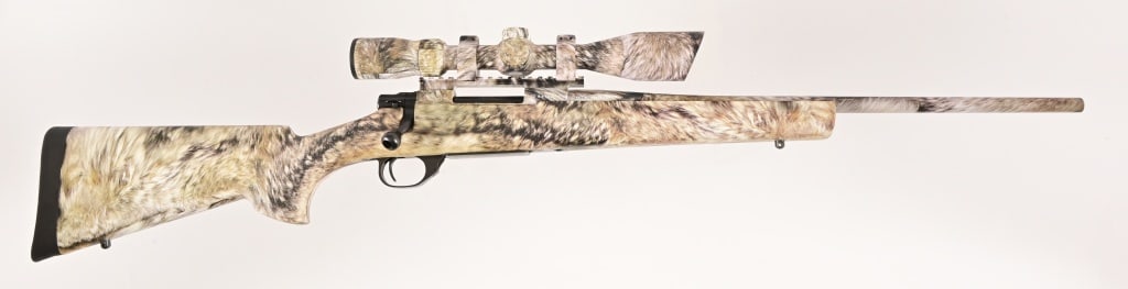 Howa Model 1500 - .22-250 REM With Scope: S/N: B419335. Camo pattern, bolt action rifle with Nikko Stirling Nighteater 2.5-10x42 scope. Imported by Legacy Sports, Reno, Nevada. 20" barrel. Modern.