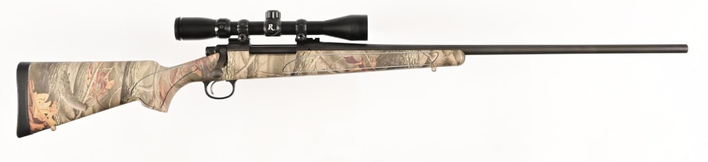 Remington Model 700 - 7 Rem Mag With Scope: 26" barrel, bolt action rifle, camo pattern, with 4-12x40 Remington scope. Modern.