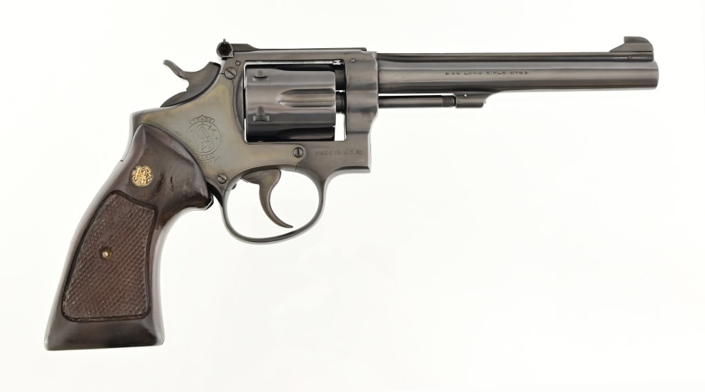 S&W K22 Revolver: S/N 89049. 6" barrel. Modern.