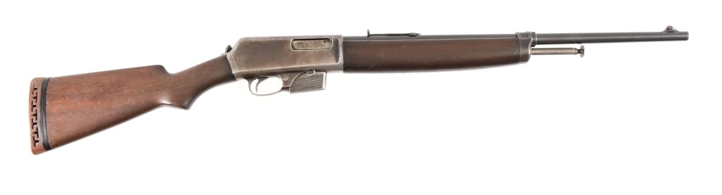 Winchester 1910 SL .401 Rifle: S/N: 5549. 20" barrel, cracked forward stock on LH side, initials "JH" on rear stock on LH side. Modern.