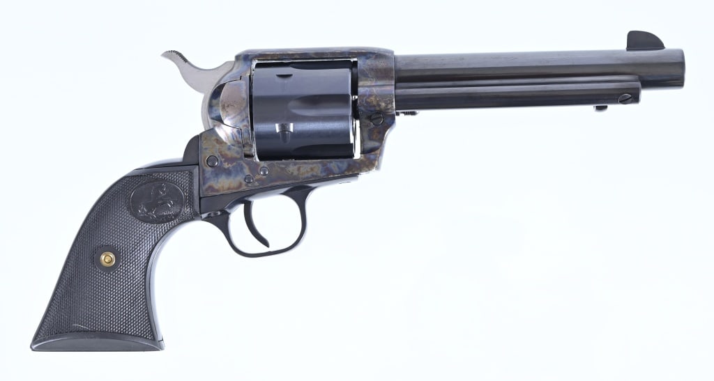 Colt Cowboy SA .45 Colt Revolver: S/N: TFO3843. 5 1/2" barrel, blue finish, unfired condition, original factory case. Modern.