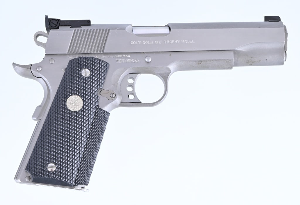 Colt 1911 Gold Cup Trophy .45 ACP: S/N: GCT40933. 5" barrel, stainless steel finish, unfired condition, rubber grips, extra magazine, original factory case. Modern.