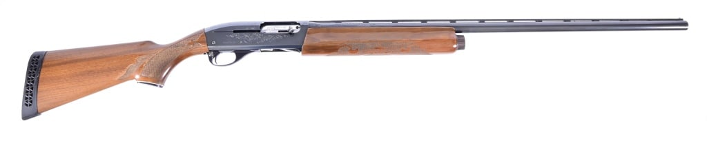 Remington 1100 12 GA Magnum Semi-Auto Shotgun (1 of 3)