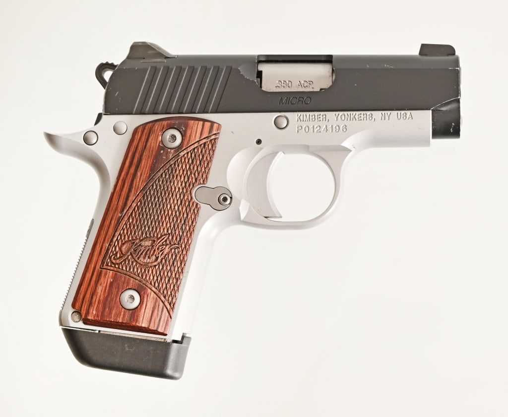 Kimber Micro .380 ACP: 2 3/4" barrel, 2 extra magazines, holster, soft case, in original factory box. SN: P0124196. Modern.