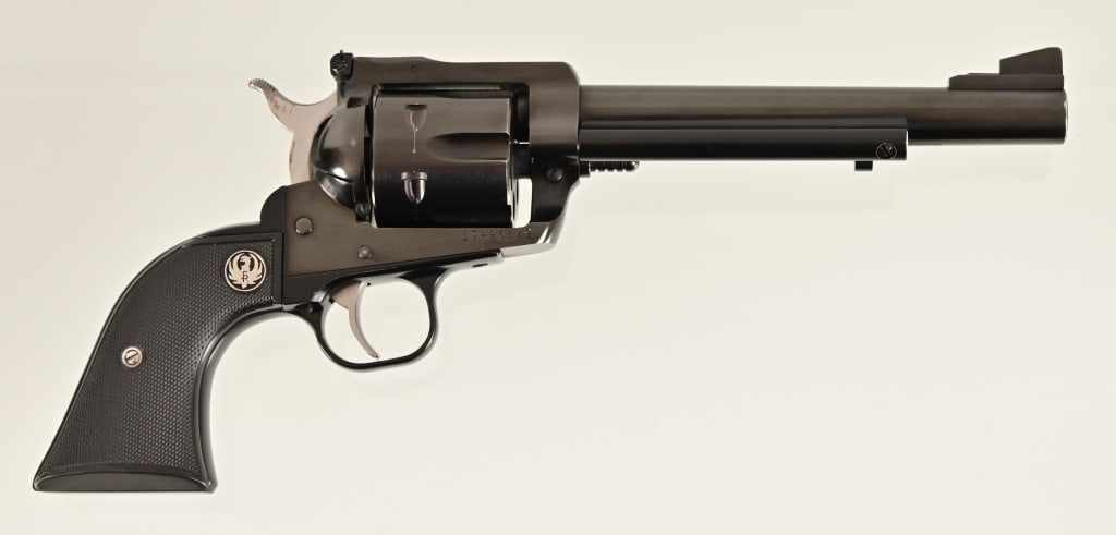 Ruger New Model Blackhawk .357 Magnum Revolver: S/N 37-95149. In original factory case. 6 1/2" barrel. Modern.