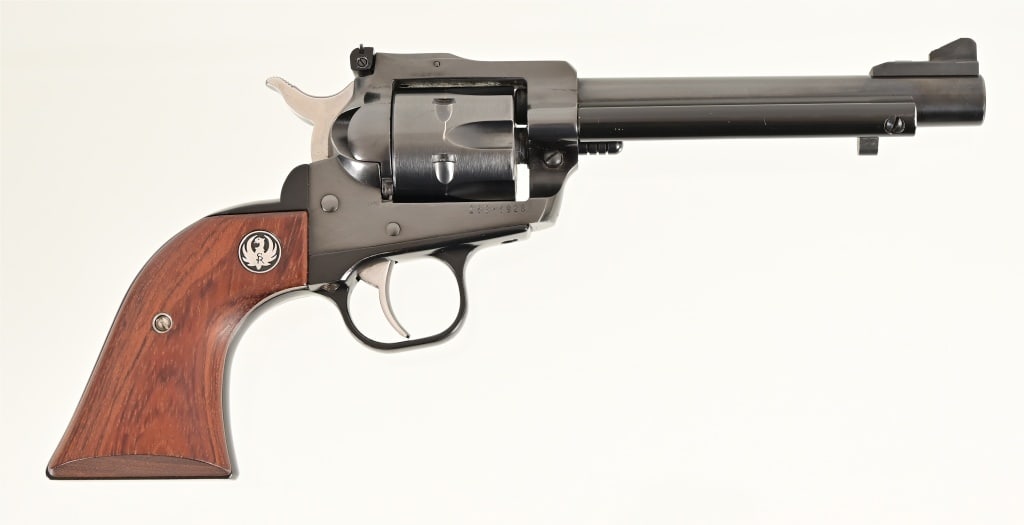 Ruger New Model Single Six .22/ .22 Mag. Revolver: S/N 263-69288. In original factory case. 5 1/2" barrel. 2 Cylinders (.22LR & .22WMR). Modern.