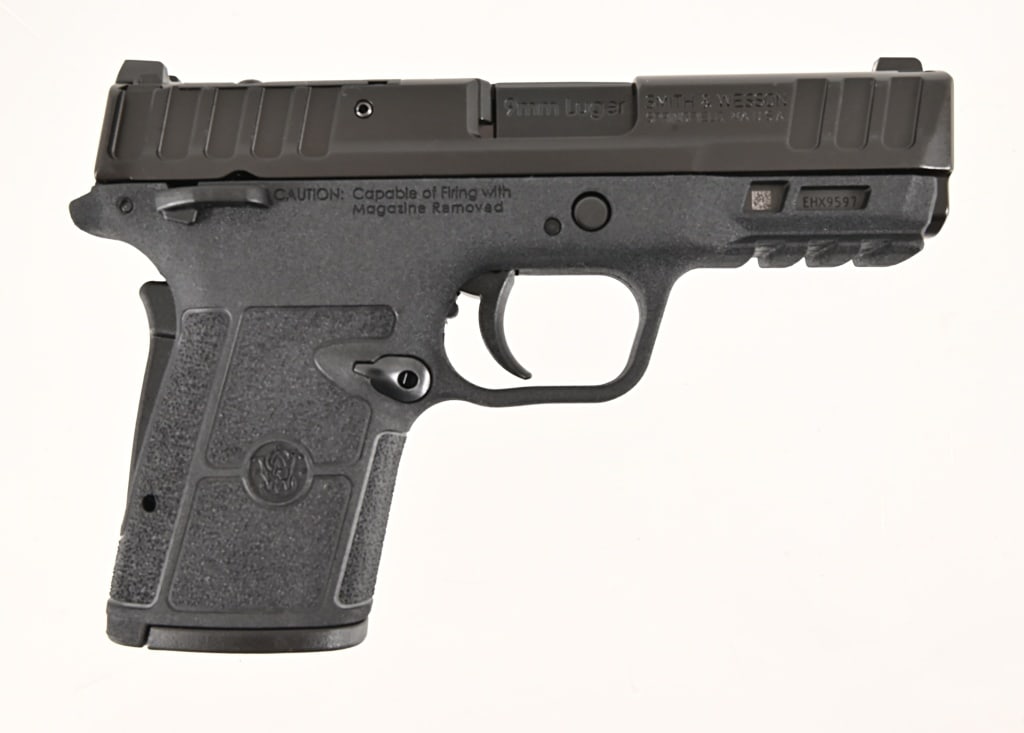S&W Equalizer 9MM Luger: S/N EHX9597. 3 5/8" Barrel. In original box with 4 extra magazines. Modern.