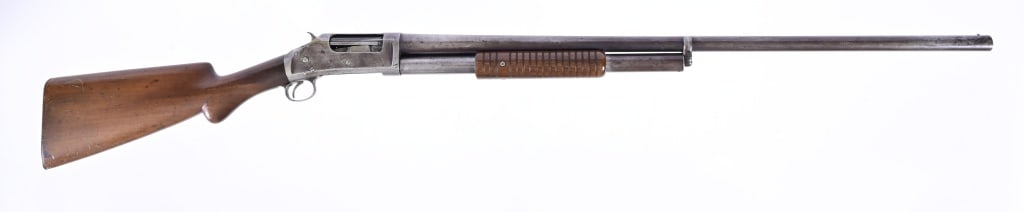 Winchester Model 1897 12 Gauge Shotgun: S/N: C117477. 32" barrel. Pump action shotgun, fixed full choke. Modern.