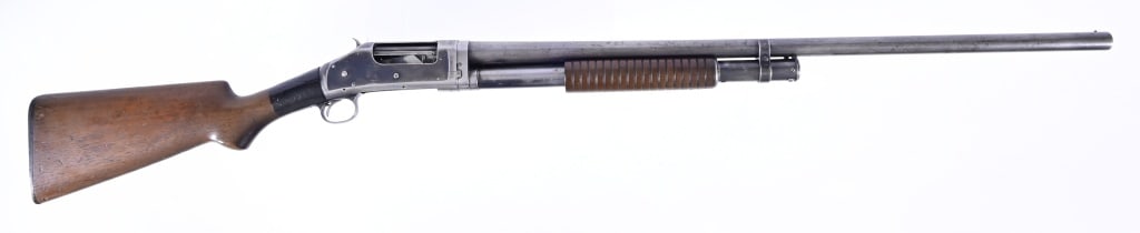 Winchester Model 97 12 Gauge Shotgun: 30" barrel, pump action shotgun, fixed full choke, 2 3/4" shells. S/N E792850. Stock has been repaired at the wrist. Made in 1924. Modern.