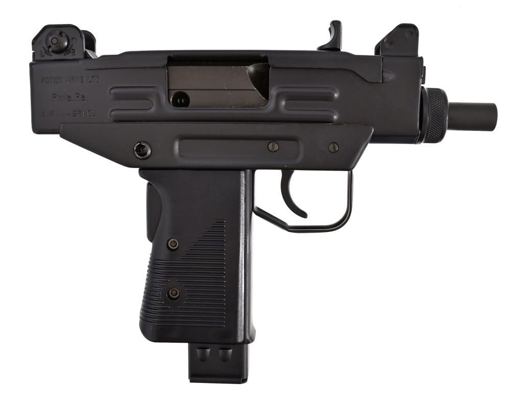 IMI Uzi 9mm Semi-Auto Pistol: In like new, unfired condition, with factory box. 4.5" barrel, one mag.