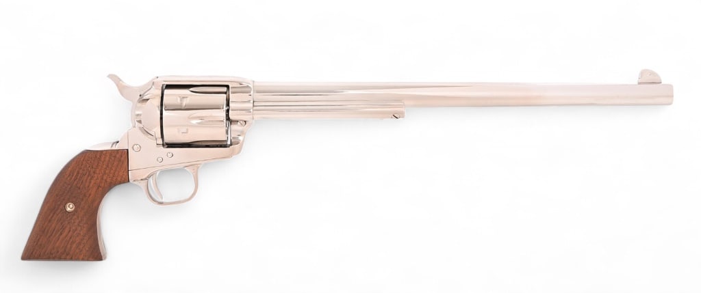 Colt 1873 SAA Buntline .44 Special Revolver: SN SA46476, factory letter shows shipped to Alaska in 1982. Nickel plated Buntline model with 12" barrel. 3rd. Gen. Very good condition, good bore, wood grips. Modern.