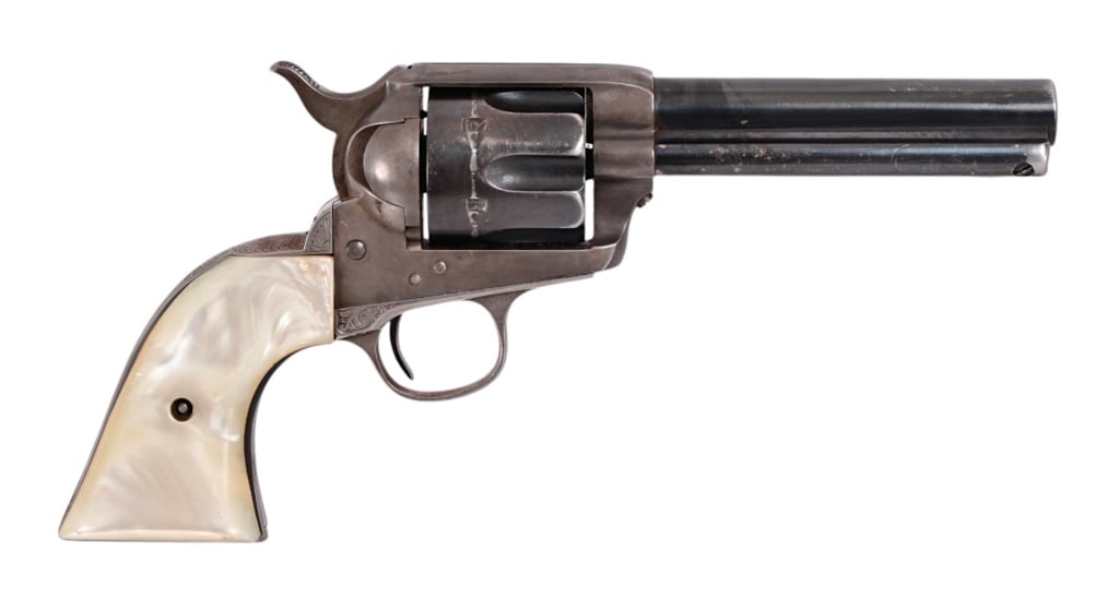 Colt Model 1873 SAA .45LC Engraved: Mixed serial numbers(126902 / 312154). Pearl grips, engraved trigger guard and back strap. Antique.
