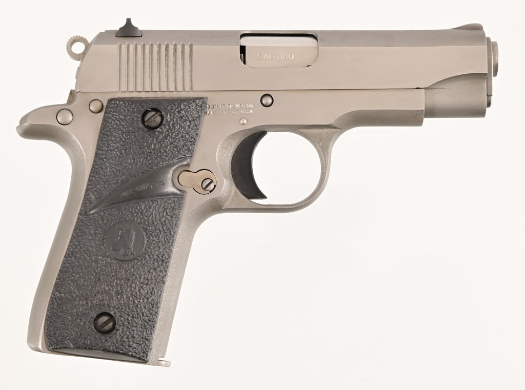 Colt MK IV Government Model .380ACP: S/N RS48536. Series 80. 4.25" barrel, good bore. Stainless with rubber grips. Modern.