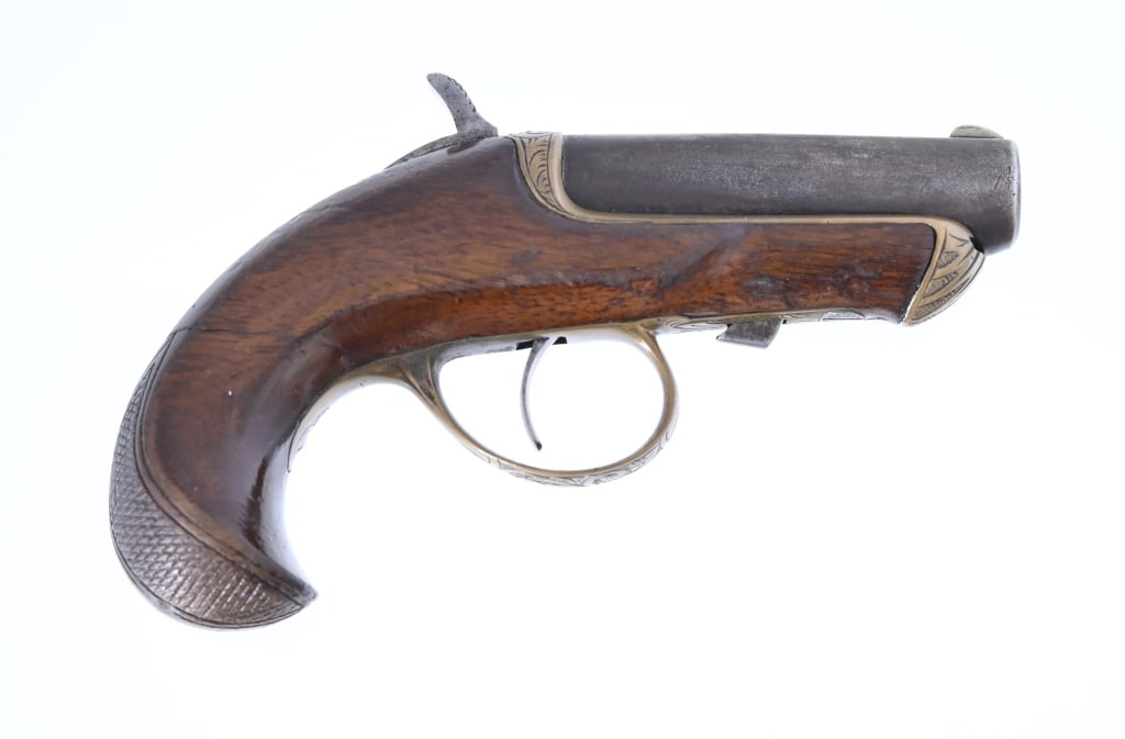 Williamson Derringer .41 Rimfire: Unique sliding barrel design. 2 3/8" barrel. Nice condition, working action. Antique. Mfd. 1866-1870 by the Moore's Patent Firearms Co